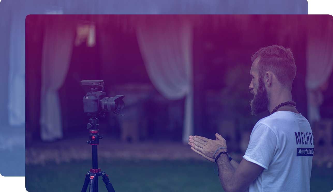 Screenshot of a video of Jim Kwik on stage