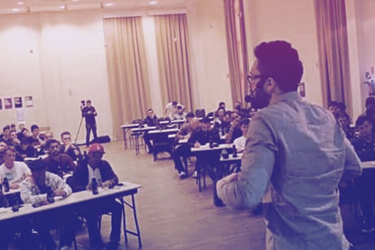 Two people hugging each other